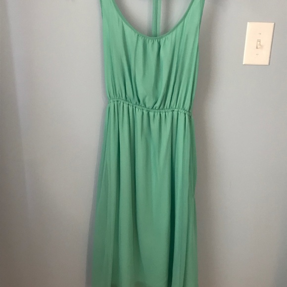 Mint green bow racer back mini dress. - Picture 2 of 4